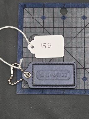 Coach Shimmering Blue Leather Bag Tag with Ball Chain